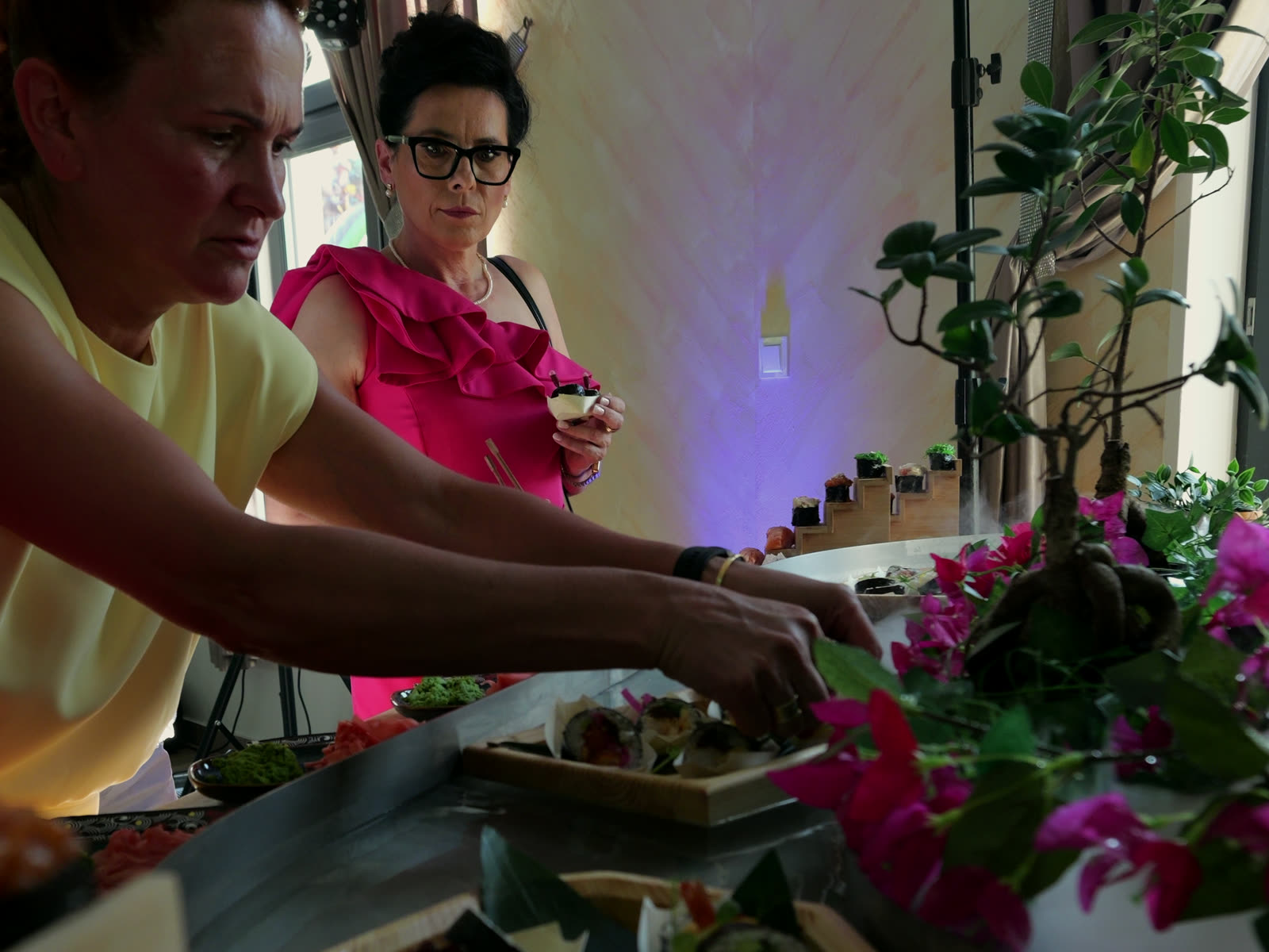 Guests helping themselves from the river mid-event