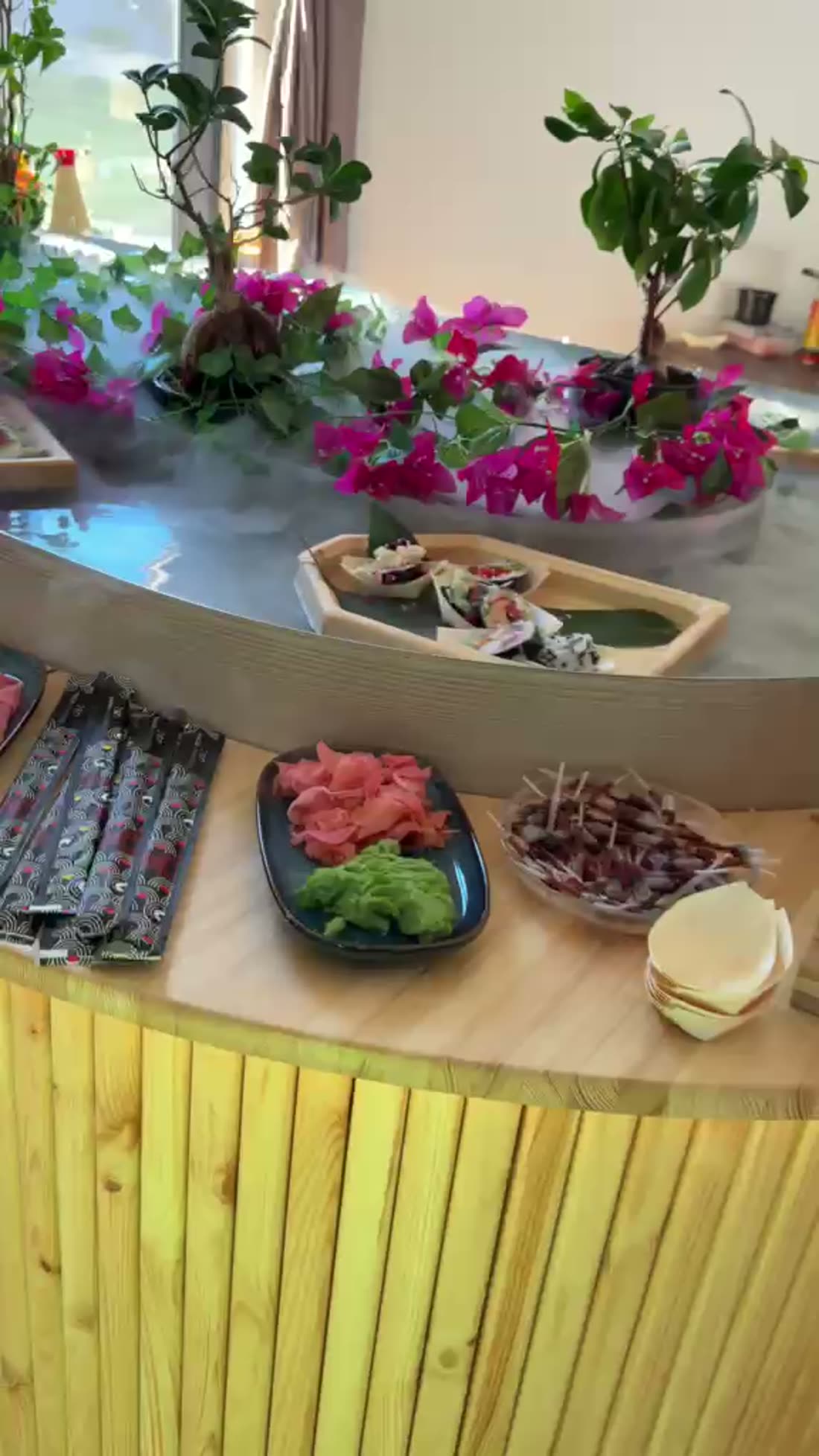 Guests reaching for food from the rim